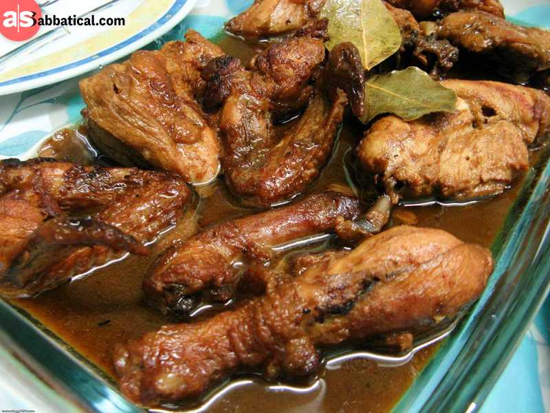 Chicken Adobo is a dish influenced by the Spanish.