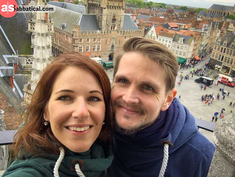 Panda and Adrian overlooking the big market square of Bruges, Belgium