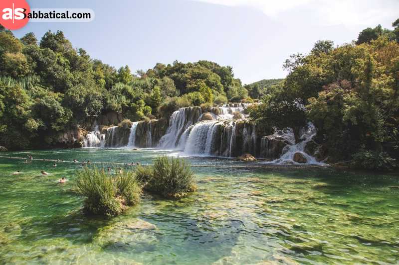 Swimming in a crystal clear water of Krka national park