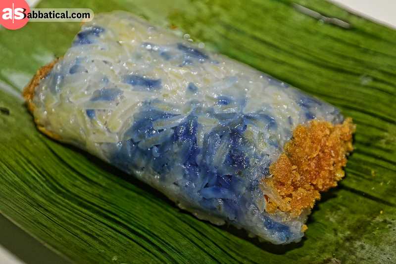Pulut Panggang is grilled glutinous rice wrapped in a banana leaf.