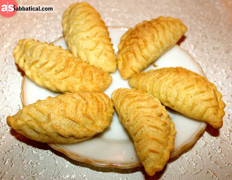 Shekerbura is a sweet pastry filled with nuts, served for Novruz. It is a dessert prepared in group for a special occasion.
