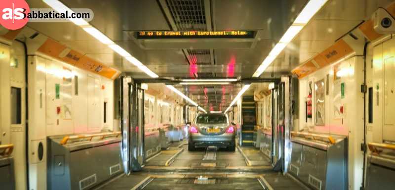 Driving with our car into the train that is crossing the EuroTunnel