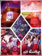 sit hütte - dancing in full snowboard gear into the sunset behind the glowing mountains