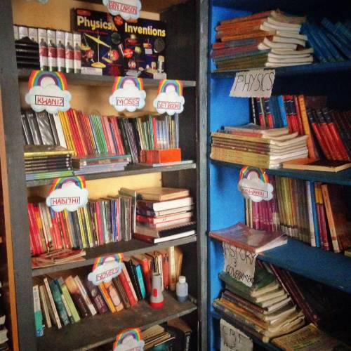 bookshelf in african school representing why you should be reading more