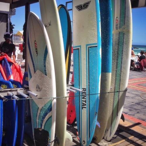 surfboards ready to hit the waves in cape town, south africa