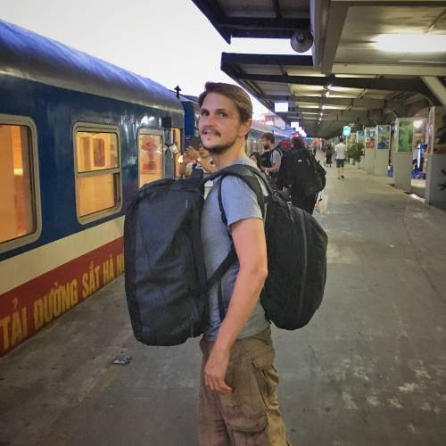 Wanderlust: standing at a railway train station with all your belongings
